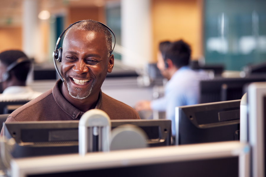 Customer Service representative on the phone with a client